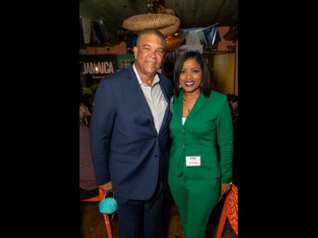 Jamaica’s deputy director of tourism in charge of the USA, Donnie Dawson, share lens time with Simone Roxburgh Foster, project manager, Jamaica Rum Festival.