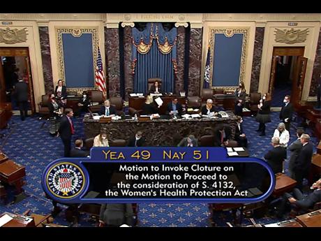 In this image from Senate TV, the tally of a Senate vote that was taken on the Senate floor is shown on Wednesday, May 11, at the Capitol in Washington.  