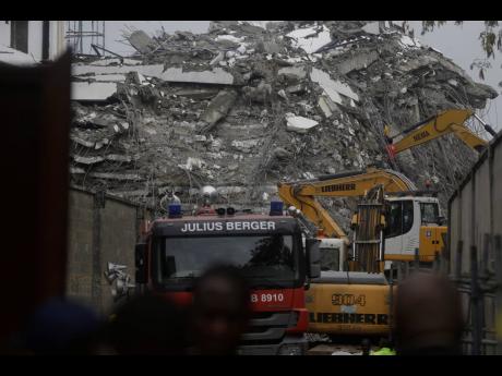 
A view of the rubble of the collapsed 21-story apartment building under construction in Lagos, Nigeria, November 2, 2021. 