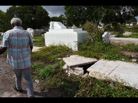 Several graves were badly damaged inside the May Pen Cemetery in Kingston.