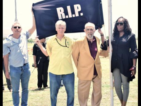 
From left: Laurence Heffes, president of the Jamaica Racehorse Owners Association, Brian Rickman, veteran horse-racing announcer, Howard Hamilton, racehorse owner and Lorna Gooden, general manager of Supreme Ventures Limited pay tribute to the late Chris 