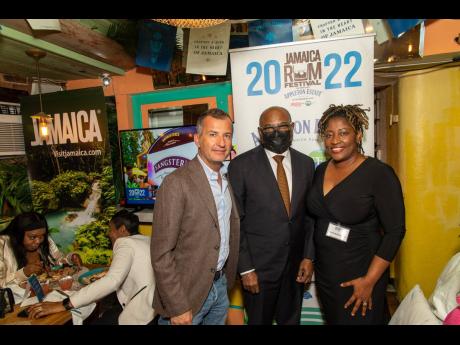 Minister of Tourism, Edmund Bartlett (centre), flanked by Chief Financial Officer, Campari, Lorenzo Banfi (left) and J Wray and Nephew Foundation’s Senior Director, Public Affairs and Sustainability, Tanikie McClarthy-Allen. 