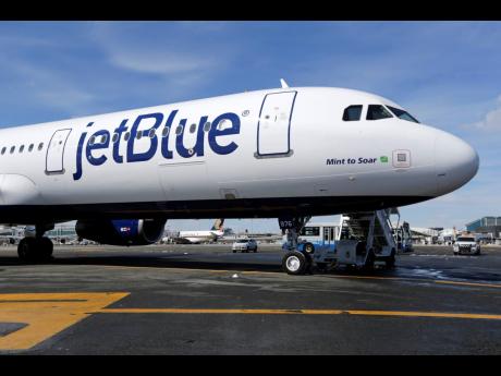 A JetBlue airplane is shown at John F. Kennedy International Airport in New York on March 16, 2017.