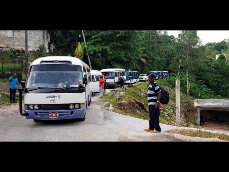 Buses transporting Westwood High School students had to abandon their trip yesterday morning as residents of Retreat blocked the roads.