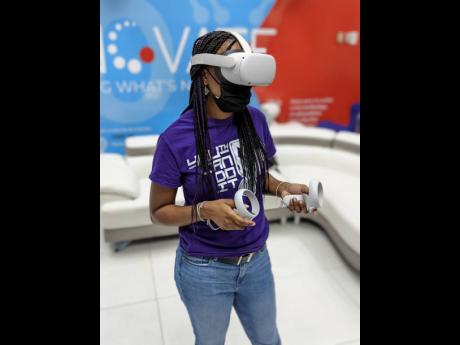 Cherika Wilson in Oculus (virtual reality) headset.