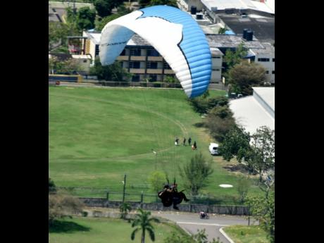 Gleaner reporter Asha Wilks is given her fist paragliding session by Ingo Hillmann, paragliding pilot for over 22 years and co-owner of Paradise Wings. The paragliding company Paradise Wings Jamaica conducts paragliding trips for people who are willing to 
