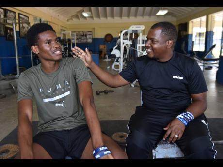 
Jamaica College honour student and athletics star J’Voughnn Blake reflects on his journey and talks plans for the future with coach and mentor Duane Johnson in a Sunday Gleaner interview at the Old Hope Road-based school last week.