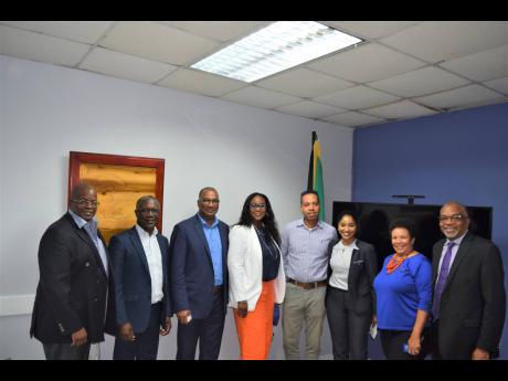 Representatives from the Shipping Association of Jamaica’s port community system (PCS) and the Barbados PCS steering committee at the SAJ head office in Newport West last Thursday. 