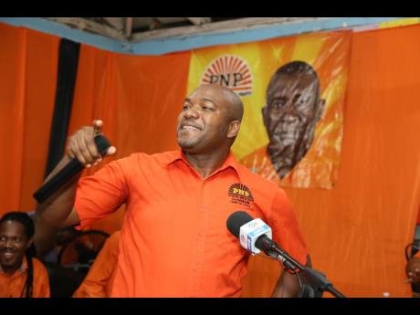 Lothan Cousins, opposition spokesman on agriculture and MP for Clarendon South Western, addressing the PNP’s divisional conference at Toll Gate Primary School on Sunday.