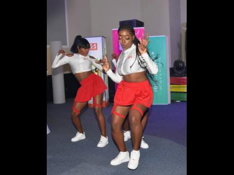 Chin City Girls (from left) Martina Franklin and Zoye Simmonds showed guests at the launch the latest dance moves.