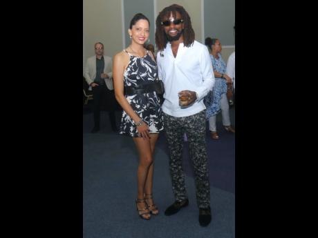 Hitting fashionable notes were Anna-Kaye Russell-Byles (left) of  Pier 1 and Christopher Gordon of Island Strains. 
