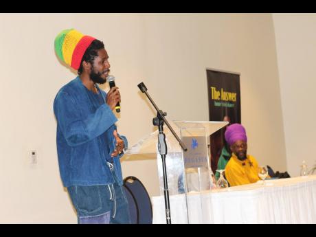 Reggae singer-songwriter and ambassador for Priest Kailash Leonce’s Reclaiming Wellness and Reproductive Health Tour, Chronixx, commands the microphone and the attention of the audience present. 