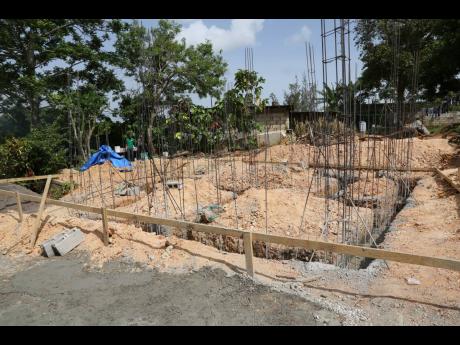 The foundation of the two-bedroom house that is being built for Jordeen Mason and her family. Residents of her Kellits community offered their support on Labour Day to get the project started.