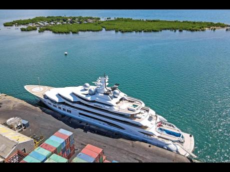 The superyacht ‘Amadea’ is docked at the Queens Wharf in Lautoka, Fiji, on April 15. The superyacht that American authorities say is owned by a Russian oligarch previously sanctioned for alleged money laundering has been seized by law enforcement in Fi