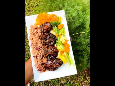 Bailey brings justice to this Jamaican delicacy: Slow braised oxtail cooked in a delicious, rich sauce, served with traditional rice and peas and steamed vegetables.