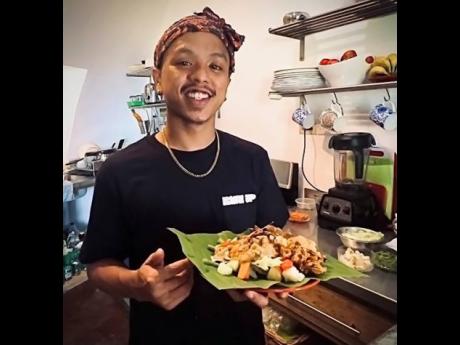 Indonesia reggae artiste and chef Samuel Walukouw serving up Indonesian food at a recent workshop in St Andrew.