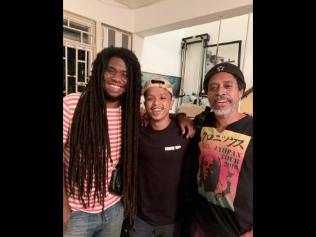 Java Jukebox’s Walukouw with veteran Jamaica musician Desi Jones (right) and his son, Joshua.