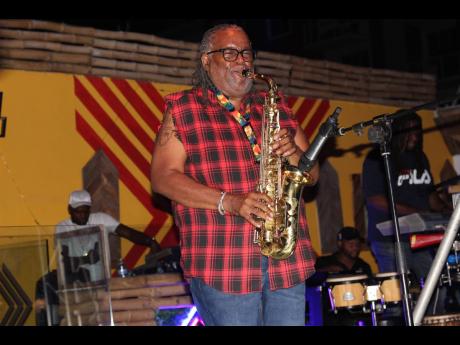 Dean Fraser lets his saxophone do the talking while on stage at 8Rivaz at The Cove Restaurant where Thursday Night Live was held on Thursday. 