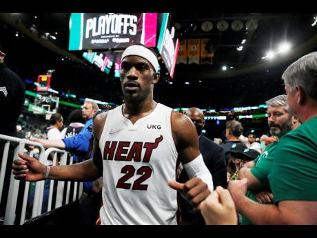 
Miami Heat’s Jimmy Butler leaves the court after the team’s win over the Boston Celtics during Game 6 of the NBA basketball playoffs Eastern Conference finals on Friday.