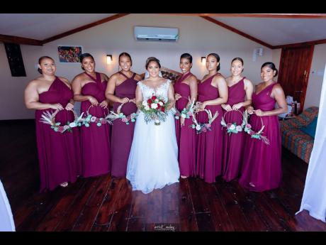 The stunning bride is surrounded by the group of supportive women she is honoured to call her bridesmaids.