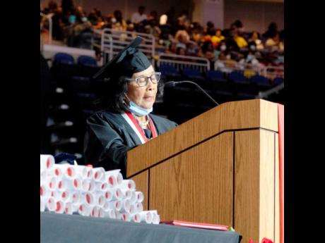 Patricia ‘Miss Pat’ Chin addresses the graduates at York College after receiving the institution’s first Presidential Medal.