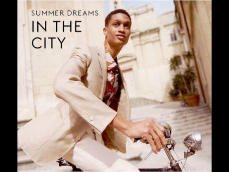 Dixon in a Corneliani blazer, Sandro shirt and James Perse trousers for his just-released editorial for The OutNet.