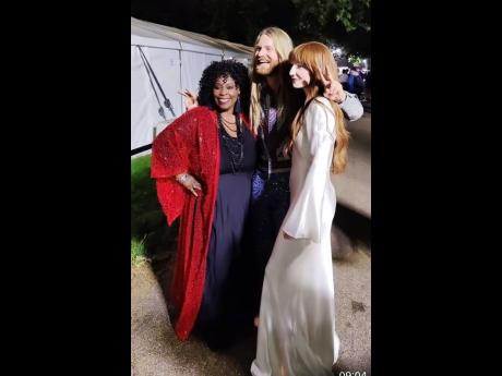 Singers Ruby Turner (left) and Nicola Roberts with a friend backstage at the jubilee concert at Buckingham Palace. 
