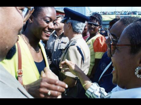 
Merlene Ottey arrives at the Norman Manley International Airport in October of 1993 to a hero’s welcome.