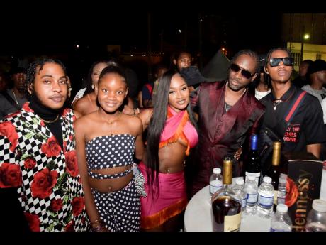It was love all around for Bounty Killer on his 50th birthday, as he is surrounded by his children (from left) Javar, Rajana, Jessica and Myjah.