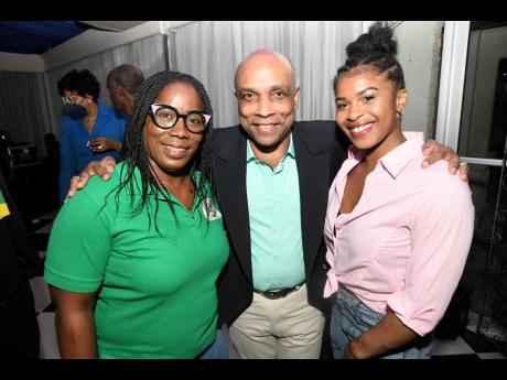 Christopher Samuda (centre), president of Jamaica Olympic Association, with Tyesha Mattis (right), gymnast, and Nicole Grant, president of Jamaica Gymnastic Association, at the 2022 Commonwealth Games press launch at the Terra Nova Hotel in St Andrew on Mo