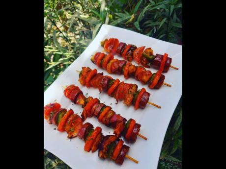 Barbecued shrimp and sausage kabobs. 