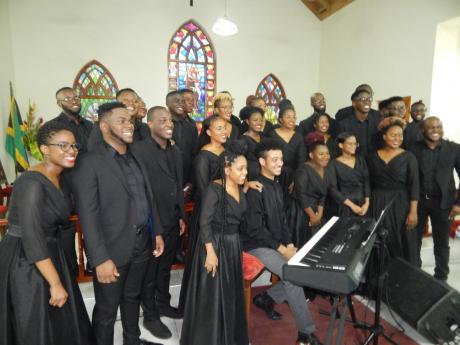 The Jamaica Youth Chorale gather together at the end of the concert on Sunday at the Church of the Good Shepherd, Constant Spring Road.