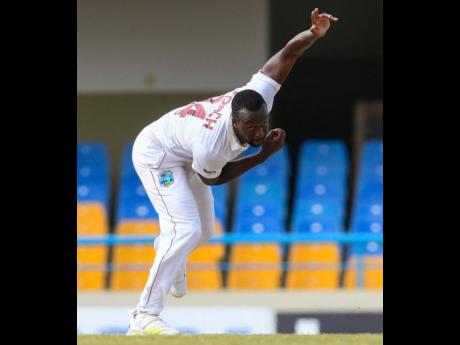 Kemar Roach, of West Indies, bowling during the third day of the first Test between Bangladesh and West Indies at Vivian Richards Cricket Stadium in North Sound, Antigua and Barbuda, on June 18, 2022. 