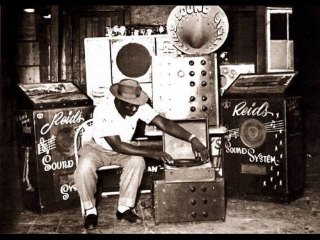 
Duke Reid with his Trojan sound system.