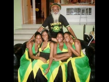 James Jones and his four daughters celebrating Jamaica's 50th year of Independence in 2012. 