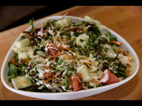 A beautiful display of the salad drizzled in dressing. 