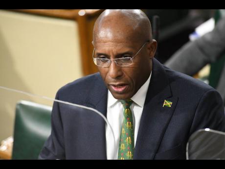 Minister of Industry Investment & Commerce, Aubyn Hill.
