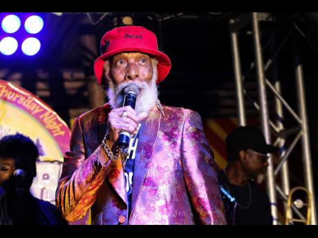 Big Youth appears pleased as the spotlight is placed on him during Thursday Night Live at Acoustic Inna Di City held at 8 Rivaz at The Cove.