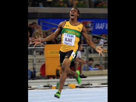 
Jamaica’s Yohan Blake celebrates winning gold in the Men’s 100m final at the World Athletics Championships in Daegu, South Korea, on Sunday, August 28, 2011.