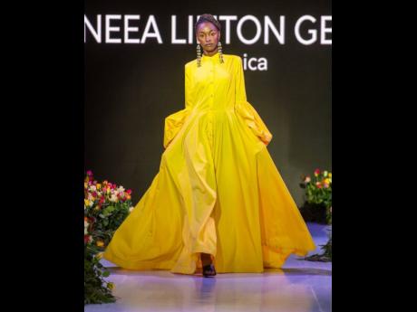 Keneea Linton-George had jaws dropping with this yellow stunner at Rwanda Fashion Week.