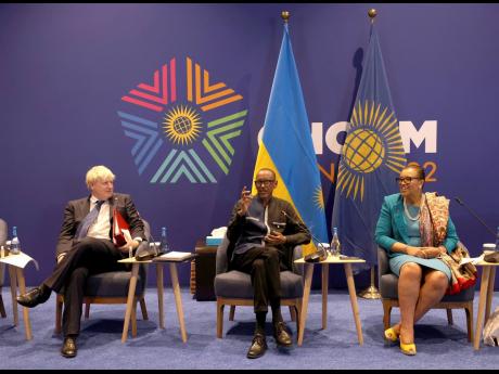 
From left: Britain’s Prime Minister Boris Johnson, outgoing chair-in-office of the Commonwealth of Nations; his successor, Rwanda President Paul Kagame; and Secretary General Patricia Scotland during the Leaders’ Retreat executive session on the sidel