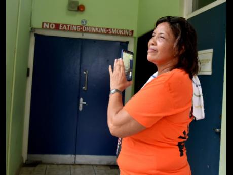 Karen Cross, who has been expelled as a member of the PNP, caused a stir on Saturday after being barred from entry to the public session of the Papine divisional conference. Cross, who is embroiled in a lawsuit with General Secretary Dayton Campbell, was e