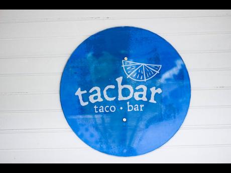Tacbar’s modern design adopts a breezy and cool colour palette of blue and white.