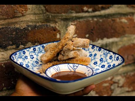 Don’t leave without dessert, the fried churros with chocolate sauce are a sweet way to end the experience. 