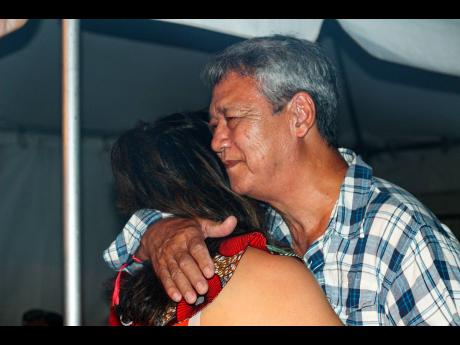 Richard Chin was overwhelmed to see his daughter Tessanne back on stage. 