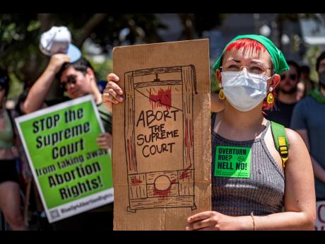 
Abortion-rights activists rally in downtown Los Angeles June 26, 2022. 