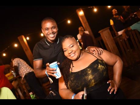 Kamal Powell, regional marketing manager (Jamaica and the Caribbean) at Campari Group, shares a spirited moment with publicist and CEO of Broadtail Designs Dania Beckford.