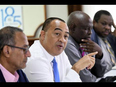 Health and Wellness Minister Dr Christopher Tufton (second left) makes a point during a Gleaner Editors’ Forum on Tuesday. Also in photo (from left) are economist Dr Damien King; Dr Brian James, president of the Medical Association of Jamaica, and Howard