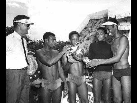 Members of the Kingston team that retained the parish title in this November 1960 Gleaner photograph. From left are Kanute Kelly, who finished second, Michael Bartlett, eighth, junior champion Brian Mitchell, who came fourth, and sixth-placed Donovan Fergu