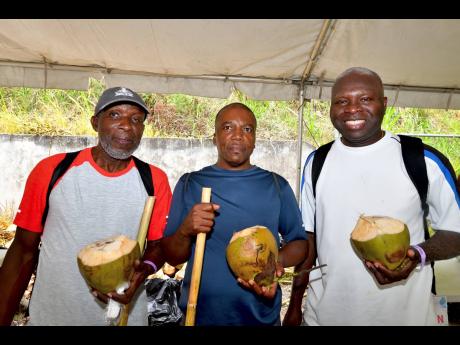 These men hydrate themselves with coconut water after completing the trek. 